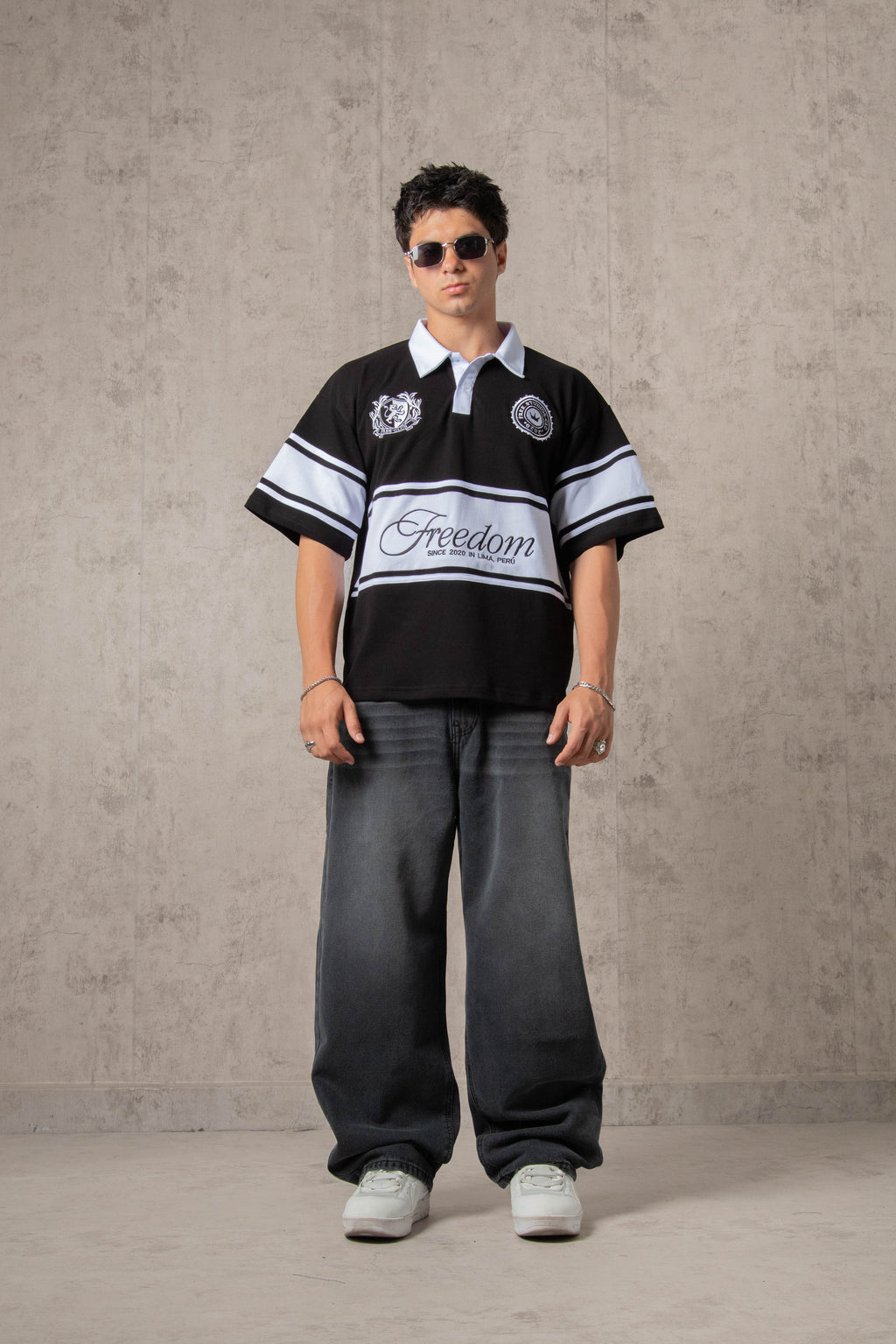 POLO PIQUÉ FREEDOM COLLEGE NEGRO