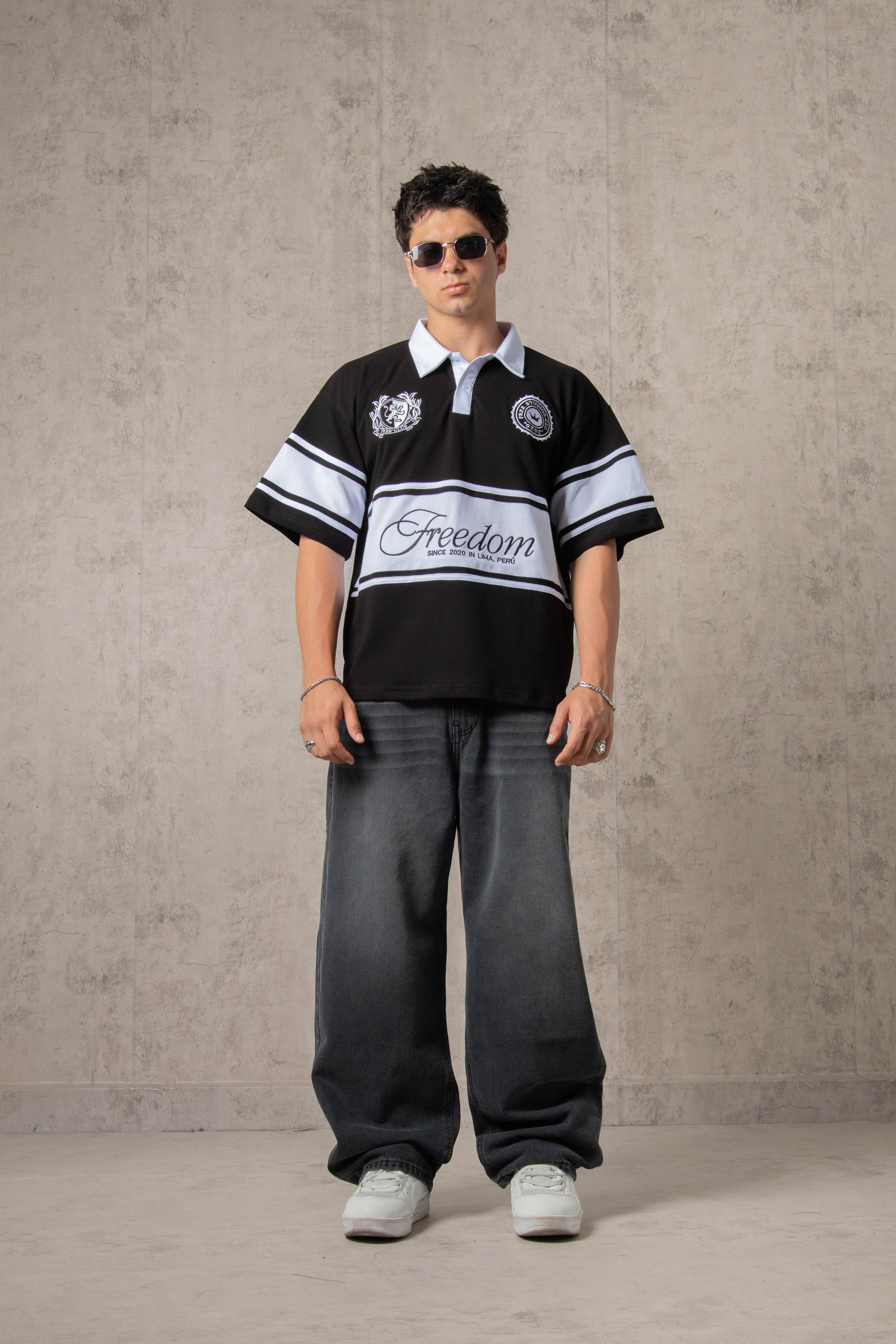 POLO PIQUÉ FREEDOM COLLEGE NEGRO