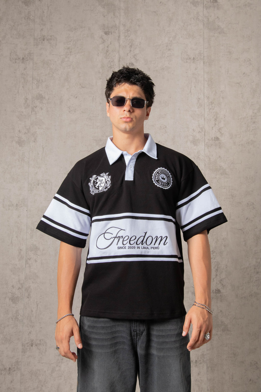 POLO PIQUÉ FREEDOM COLLEGE NEGRO