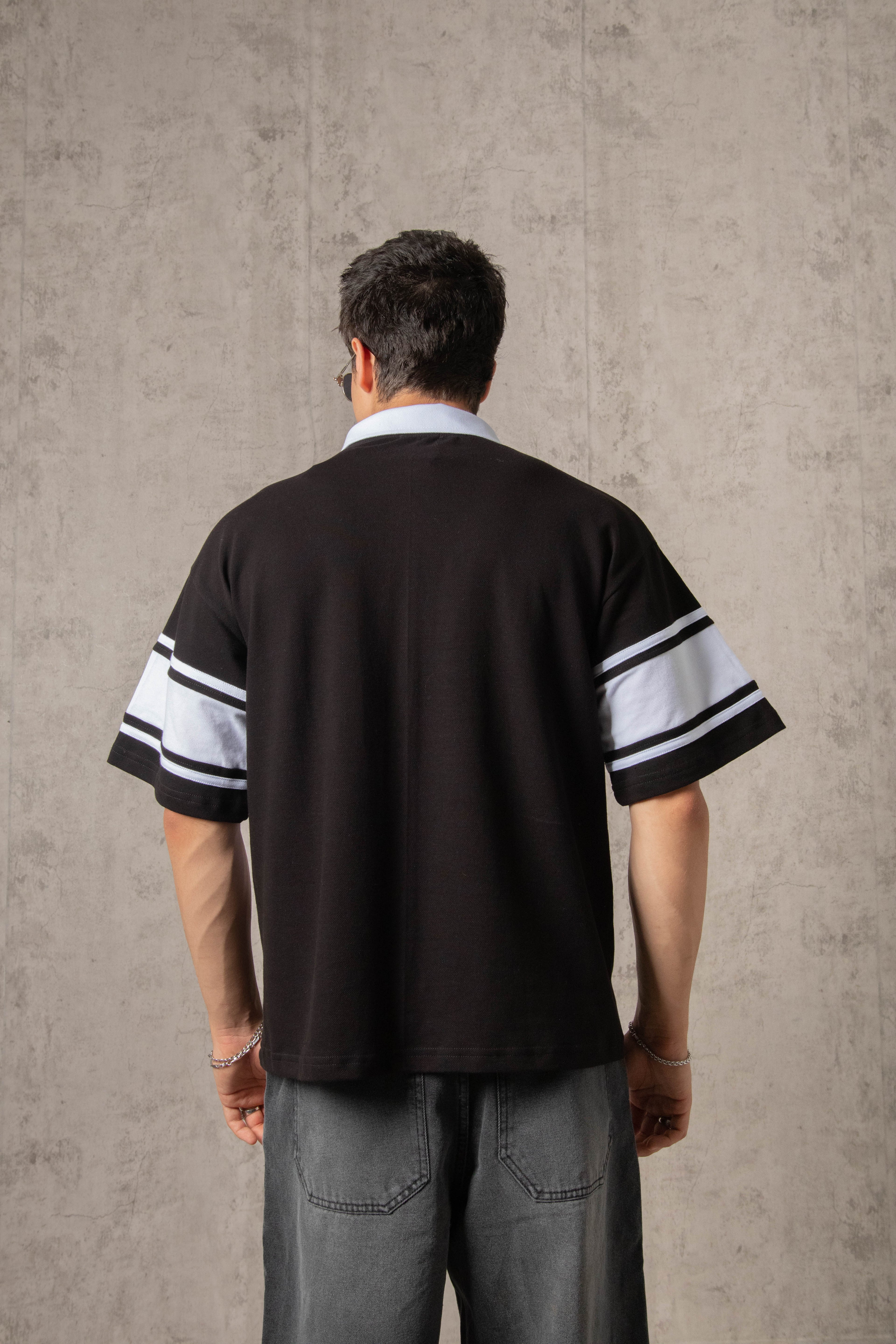 POLO PIQUÉ FREEDOM COLLEGE NEGRO