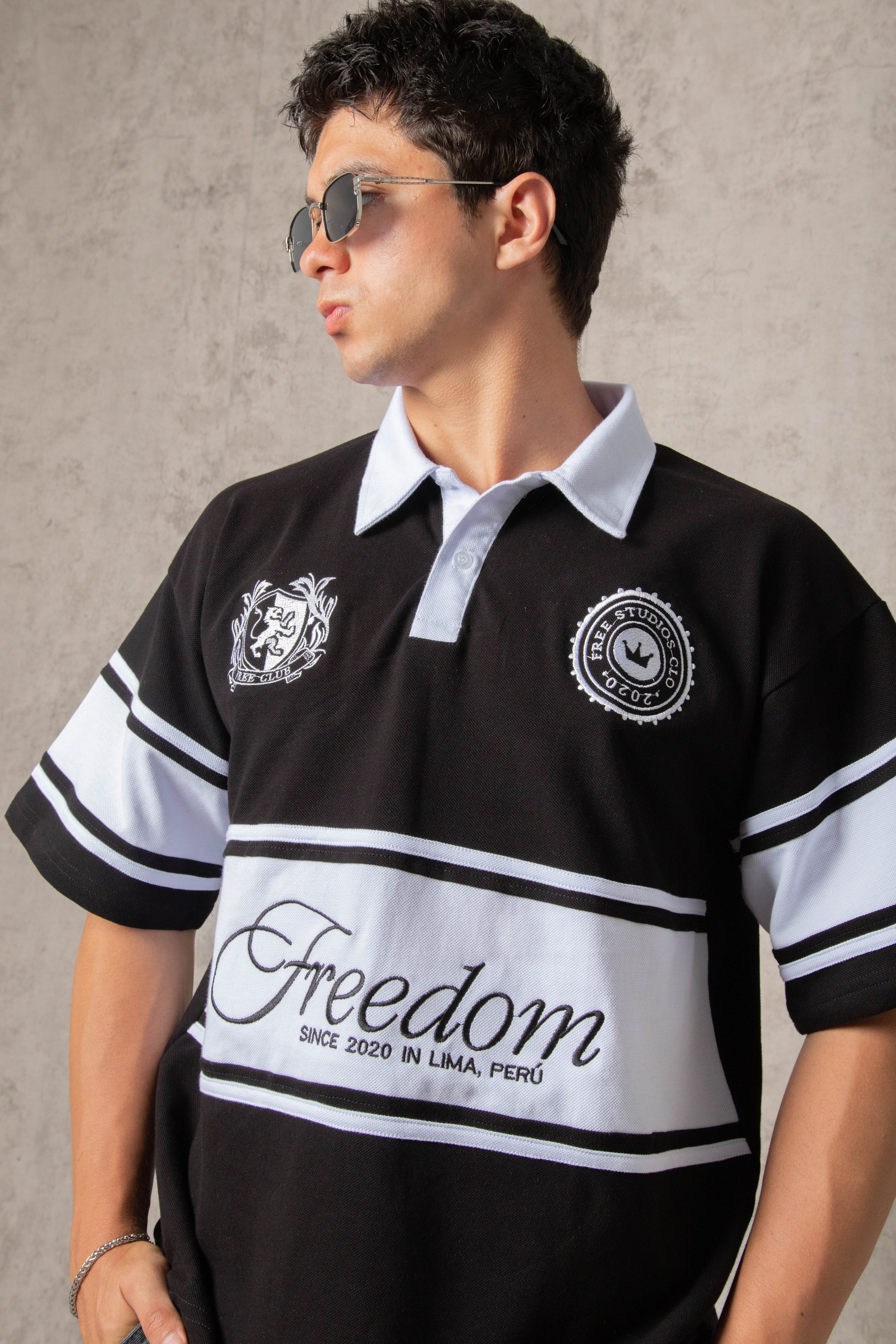 POLO PIQUÉ FREEDOM COLLEGE NEGRO